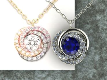 Two elegant swirl pendant necklaces, one with a clear diamond and one with a blue sapphire.