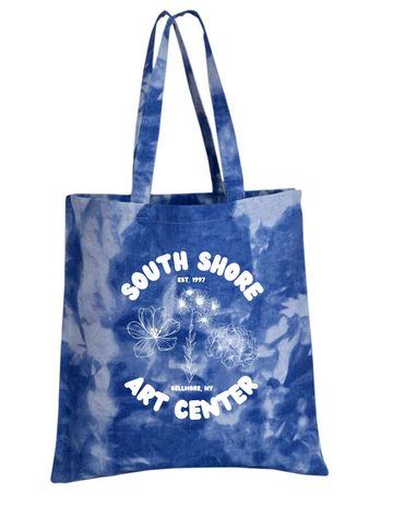 Blue tote bag with floral design and text.