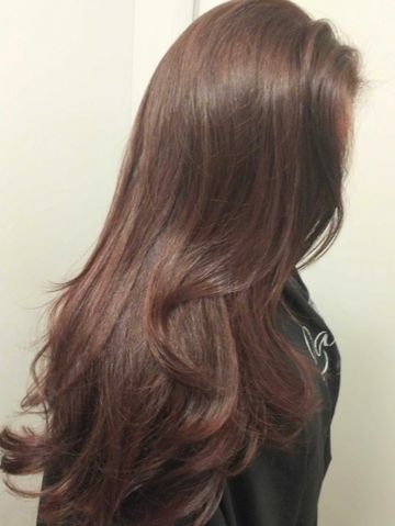 Brazilian blowout with long layers on a client created by Lady E's Mobile Hair Experience