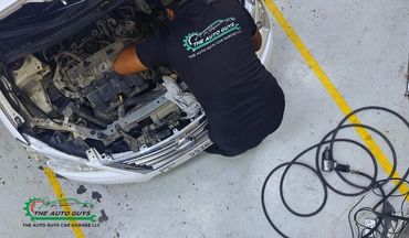 Engine diagnostics carried out by experienced technicians providing premium car care in Dubai.