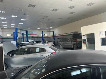 Brake system inspection & repair work in progress at a trusted auto repair garage in Al Quoz,Dubai.