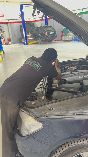 Oil Filter Checkup & oil change service performed at The Auto Guys Car Garage in Dubai.
