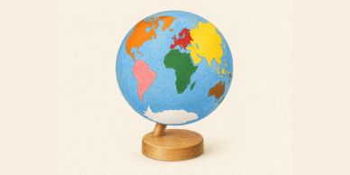 Colorful globe on a wooden stand.