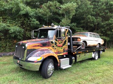 Hauling an old station wagon out of the woods