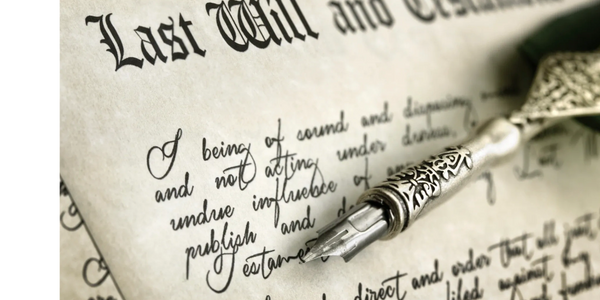 A scenic landscape with mountains, a lake, and a clear blue sky, showcasing nature's beauty.