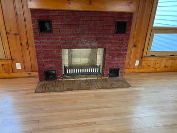 Upgrade your old fireplace not just for looks but to also produce more heat!