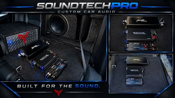 
Custom car audio setup featuring amplifiers and a subwoofer by SOUNDTECHPRO.