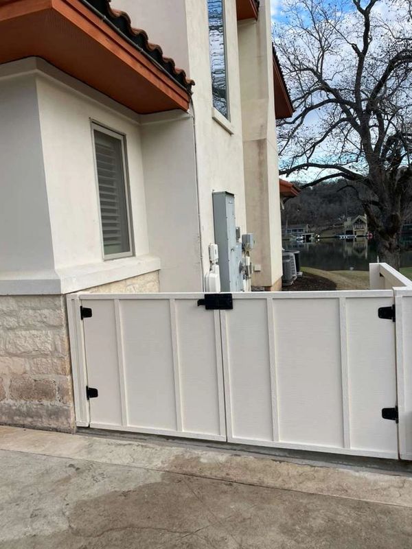 Concrete pad construction Hardie installation, custom gate fabrication fence painting.

