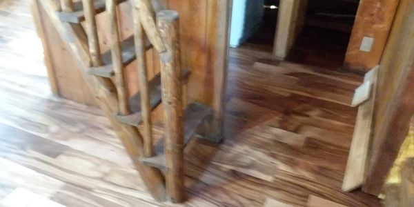 Engineered hardwood floor and rustic stairs 