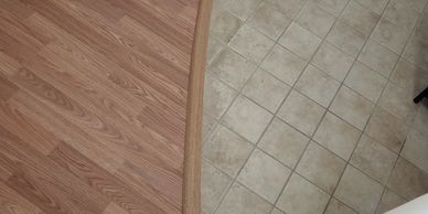 Transition from laminate flooring to existing vinyl