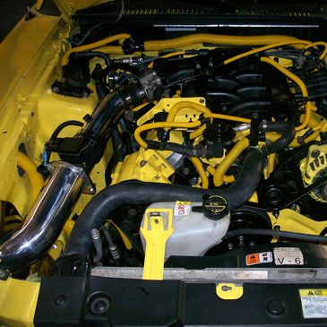 04 V6 Mustang engine rebuild. The customer wanted a yellow and black engine scheme to match the car