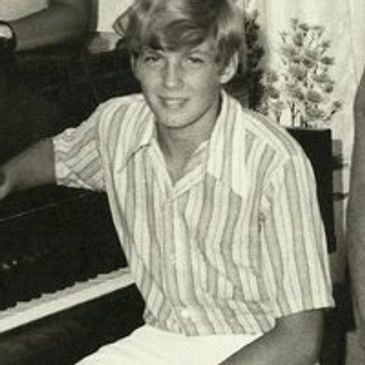 Twilight Productions President and Jingle creator sitting at the piano at age 12 with the Lindquist Family Band.