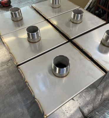 Stainless steel drain pans with couplings