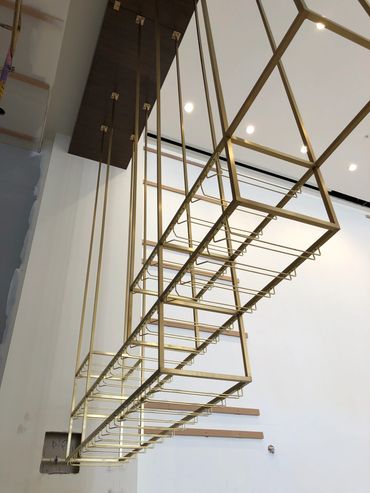 Watermark at Westwood Los Angeles, brass stemware hanging rack.