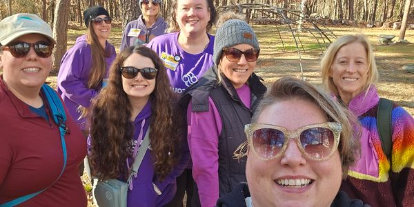 Group photo in purple spirit gear