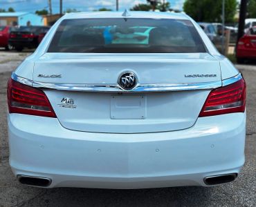 Rear view of a white Buick LaCrosse car.