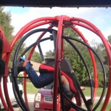 human gyroscope ride