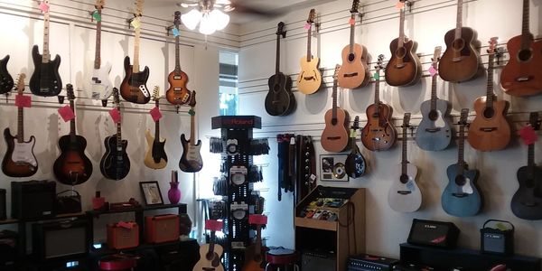 Guitar Merchant - Music Lessons, Guitars, Amps, Guitar Accessories
