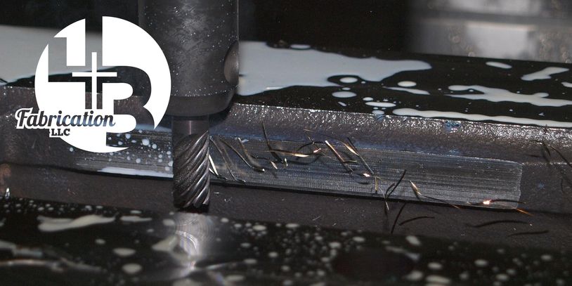 Close-up of metal milling with cutting fluid and 4LP Fabrication logo.