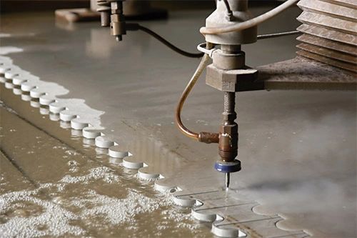 Waterjet cutting in action at Cadillac Fab