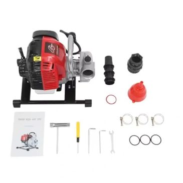 Portable water pump with accessories and manual.