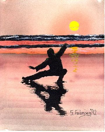 Shows a figure doing tai chi on the beach at sunset. 