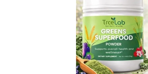 Container of TRCELAB Greens Superfood powder with fresh ingredients.