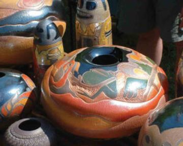 Colorful, decorated pottery pieces with intricate designs.