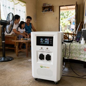 A family using a solar power system in their home living room.