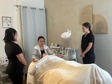 Pema of pemspa wellness and skincare in newton doing a workshop for new estheticians in luxury room