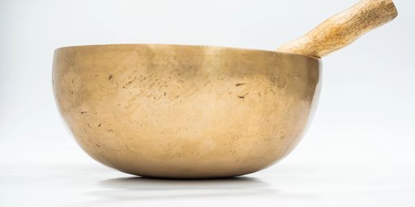 Tibetan bowl with striker.