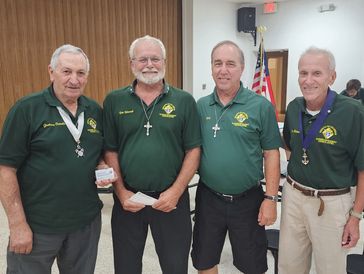 Grand Knight Jim Hebbel, and Program Director Tom Marrah recognize 50 year members Gaetano Critelli,