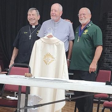 Father Joe O'Reilly receives Knights of Columbus Chasuble from council 17162. Vestments are liturgic