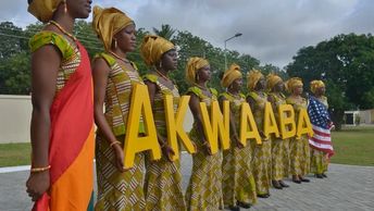 Women holding letters for AKWAABA 
