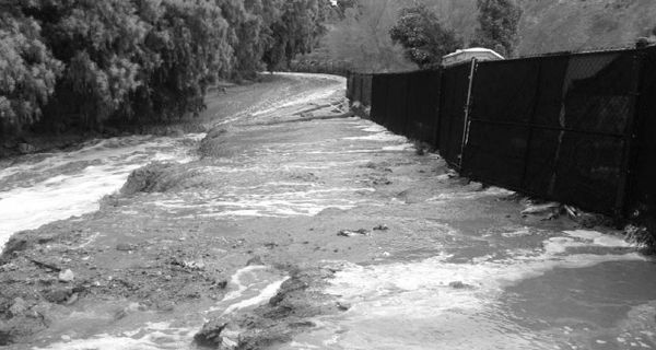 Magnesia Falls Drive  - flooding before mitigation measures.