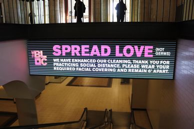 SPREAD LOVE NOT GERMS billboard at Union Station, NE Washington DC on Tuesday, 20 April 2021