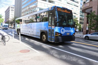 OMNIRIDE Commuter Bus along G between 12th and 13th Street, NW, Washington DC on Tuesday afternoon, 