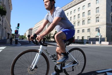 BIKE TO WORK DAY along Pennsylvania Avenue Bike Lane at 14th Street, NW, WDC on 21 May 2021