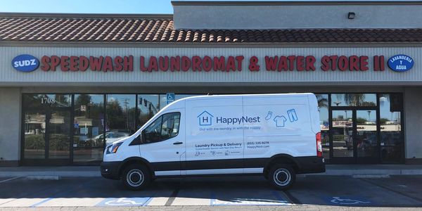 Speedwash Laundromat's Laundry Pickup/Laundry Delivery, HappyNest van in front of the laundry.
