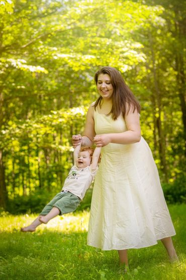 Mother swinging child, LeGalley Photography, Manistee Mi