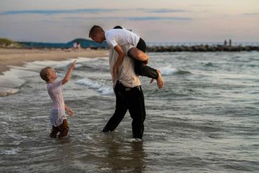 Portage point beach, onekama mi, Lake Michigan water, family photography in lake, LeGalley Photograp