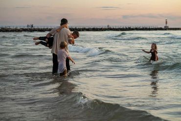 Portage point beach, onekama mi, Lake Michigan water, family photography in lake, LeGalley Photograp