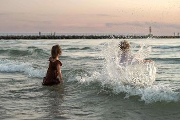 Portage point beach, onekama mi, Lake Michigan water, family photography in lake, LeGalley Photograp