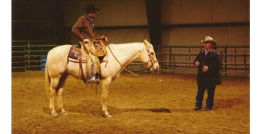 Vaughn Knudsen coaching a rider one on one