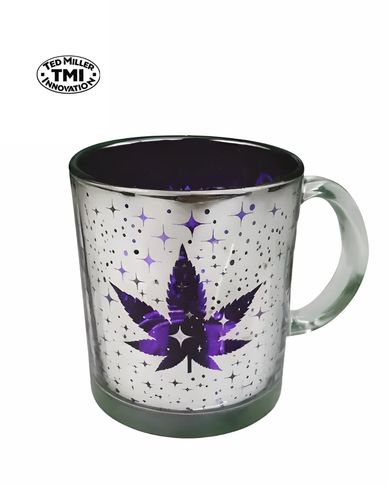 Glass mug with purple cannabis leaf and star patterns, Ted Miller TMI Innovation logo.