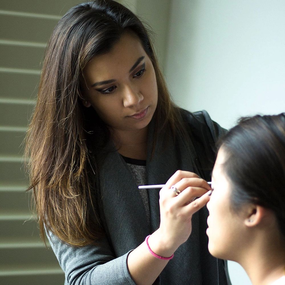 Gabby working on hair and makeup