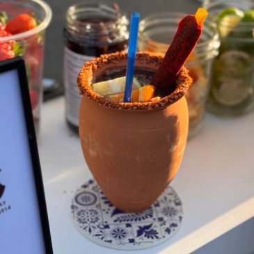 Cantarito Drink Served in a Clay Cup, Terracotta cup, barro 