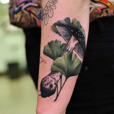 Mushroom tattoo with green 