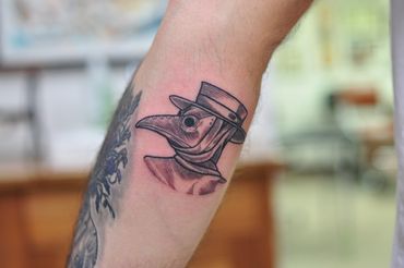 Plague doctor etching tattoo by Wade Johnston