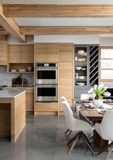 white oak modern slab west coast kitchen wood beams grain matched custom cabinets